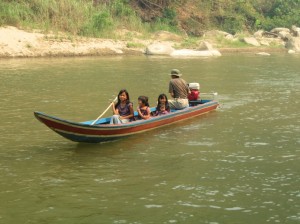 Jason taking all the girls for a spin in our new boat.